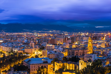 Panoramic cityscape of Malaga at evening