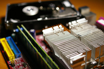 Fototapeta na wymiar Close up of a computer motherboard and hard drive.
