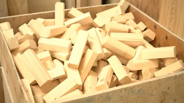 Small pieces of wood in a box in a carpenter's workshop.