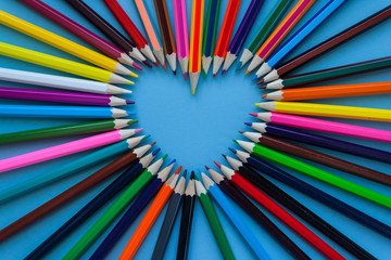 Abstract blur background. Crayon heart - Heart shape made of colored pencils