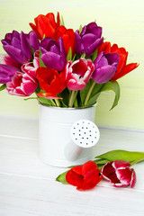 Tulip bouquet on  wooden background, copy space