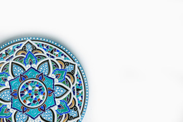 Oriental ceramic plate with beautiful colorful ornament