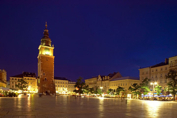 Fototapeta na wymiar Town Hall Tower in Main Market Square (Rynek Glowny) in Krakow by Night, Poland, Europe