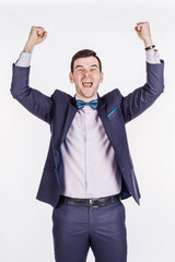 businessman holding raised arms and hands up. emotions, facial expressions, feelings, body language, signs. image on a white studio background.