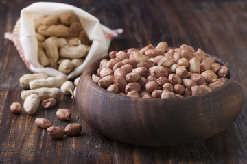 Peanuts in a wooden bowl