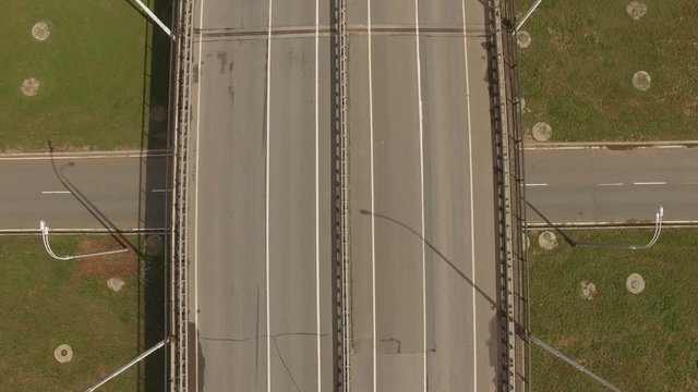 Aerial View Empty Road Junction among Green Fields