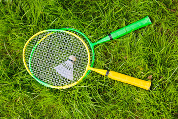 rackets for badminton and a shuttlecock