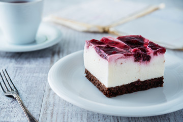 Delicious and sweet cheesecake with cherry jelly