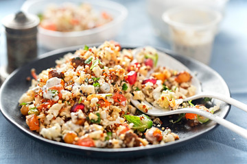 Cauliflower, quinoa & harissa spiced chickpeas with feta and mint dressing 