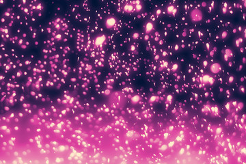 Magic festive pink or serenity background. Bokeh light and sparkles. Abstract glitter lights