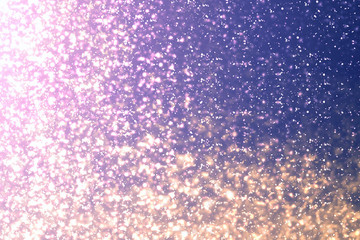 Magic festive pink or serenity background. Bokeh light and sparkles. Abstract glitter lights