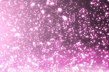 Magic festive pink or serenity background. Bokeh light and sparkles. Abstract glitter lights