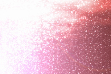 Obraz premium Red Abstract Festive Background with circles, glitter or bokeh lights. Round defocused particles. Valentines day template