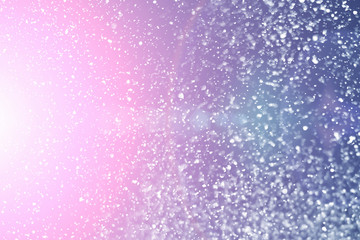 Magic festive pink or serenity background. Bokeh light and sparkles. Abstract glitter lights