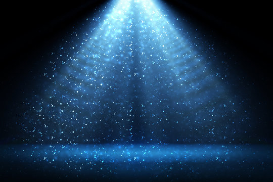 Stage light and blue glitter lights on floor. Abstract background for display your product. Spotlight realistic ray