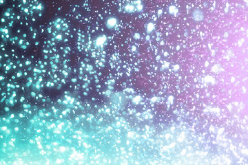 Abstract round  bokeh or glitter lights on blue background. Circles and defocused particles