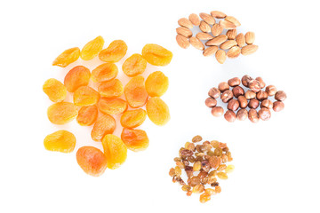 Delicacies, different spices scattered on the white background.
