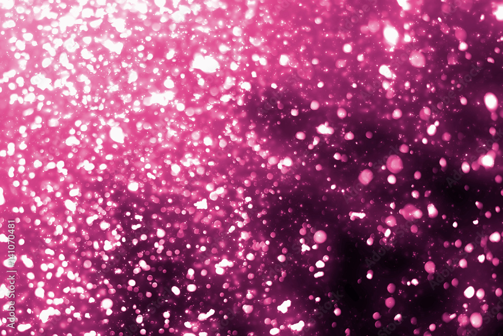 Poster magic festive pink particles isolated on black background. bokeh light and sparkles. abstract glitte