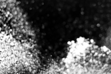 Falling realistic snow isolated on black background - design element