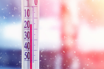 Thermometer shows winter cold. Low temperature