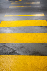 Fototapeta premium zebra crossing in yellow road markings