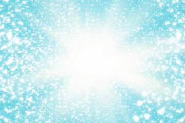 Abstract round silver bokeh or glitter lights on blue background. Circles defocused particles and rays