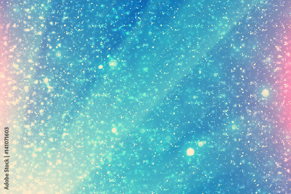 Poster abstract bokeh glitter lights and rays on blue with pink background. round defocused circle particle