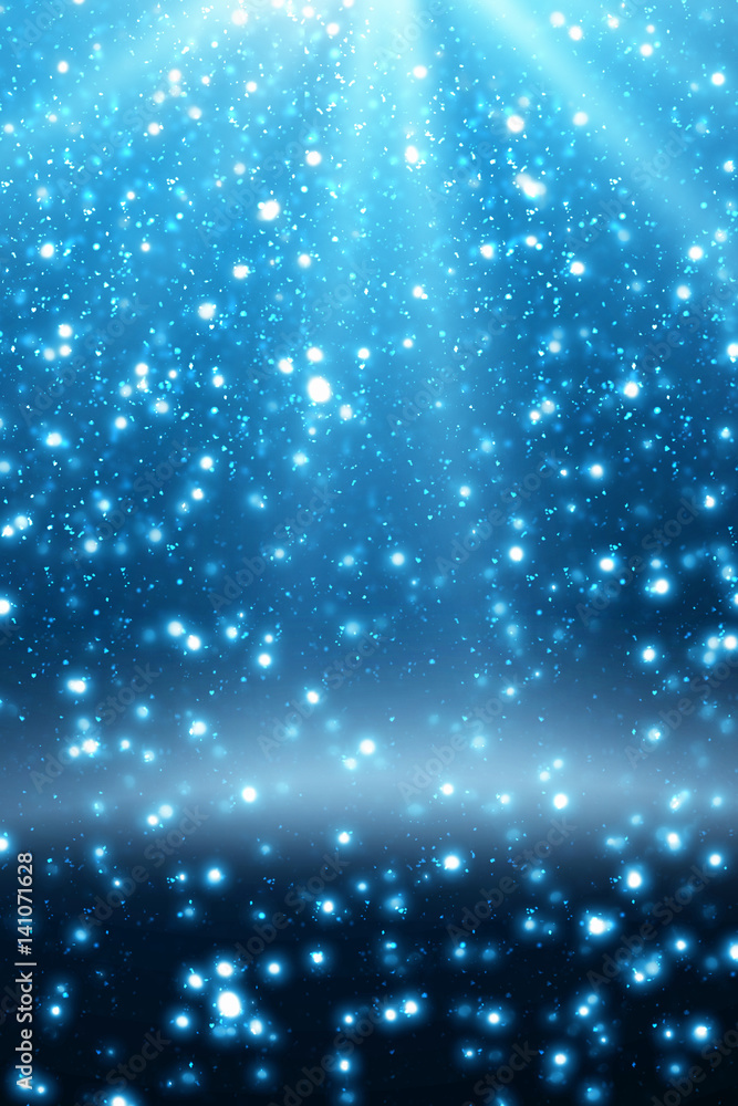 Poster abstract bokeh glitter lights and rays on blue background. round defocused circle particles. christm