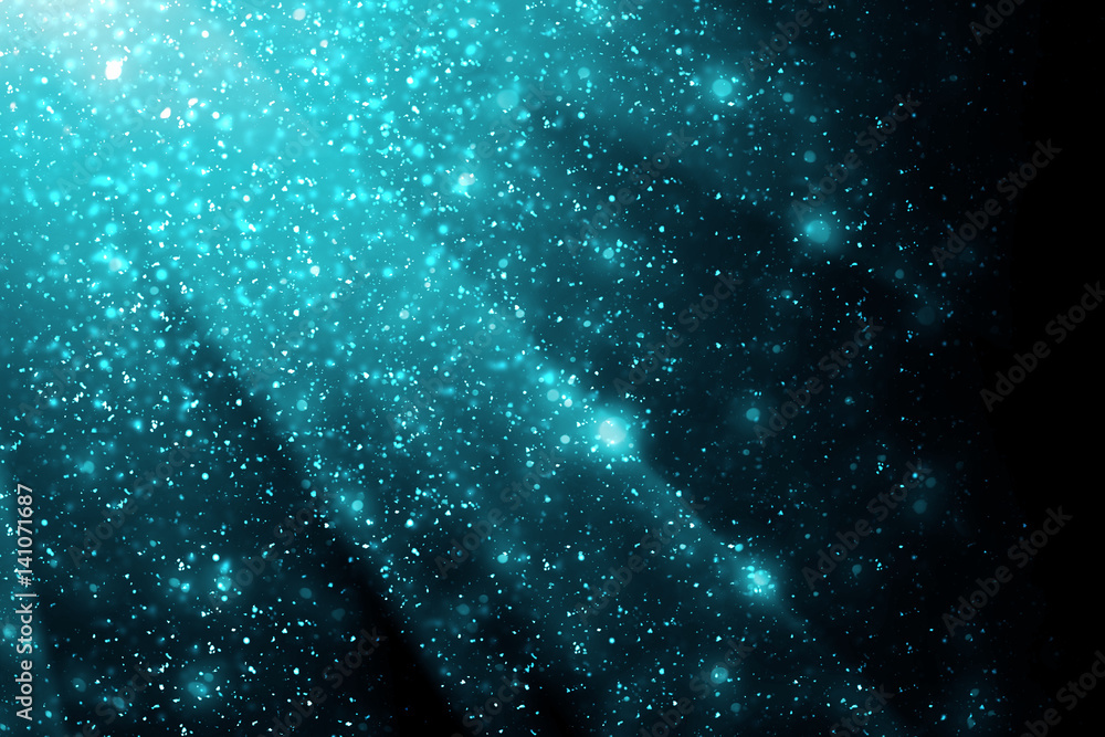 Poster abstract bokeh glitter lights and rays on blue background. round defocused circle particles. christm