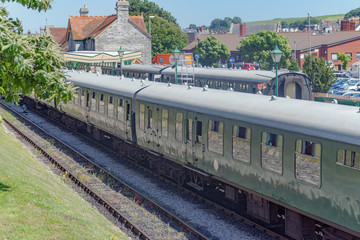 Obraz premium Steam train and carriages at Swanage railway station