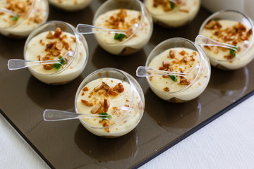 Delicious sweet buffet with cupcakes on the wedding. Sweet holiday buffet with cupcakes and other desserts.