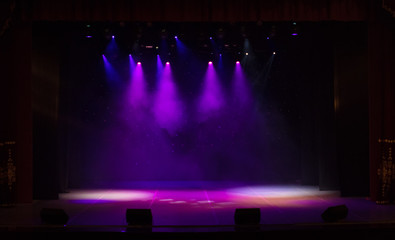 scene, stage light with colored spotlights and smoke