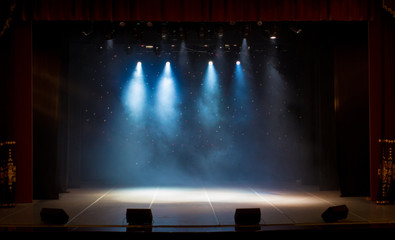 scene, stage light with colored spotlights and smoke