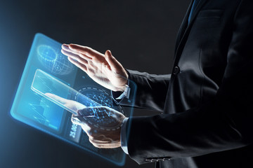 close up of businessman with transparent tablet pc