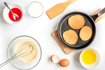 cooking pancake on white background top view ingredients for making
