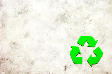 recycling symbol in eco concept on stone background top view mock-up
