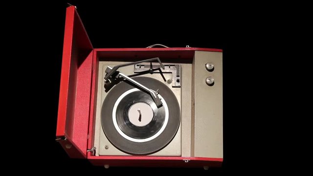 Isolated 1960's record player in red box