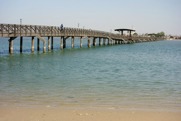 Fototapeta na wymiar Wooden Bridge between Joal and Fadiouth, Petite Cote, Senegal