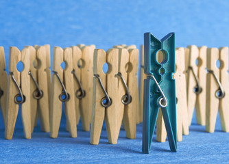 colorful wooden clothespin - selective focus, standing out from the crowd, leadership, difference...
