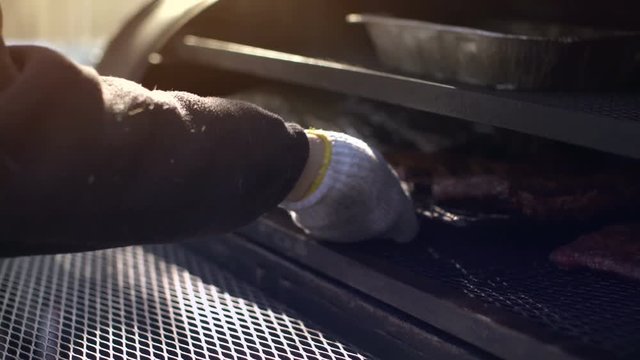 Hot barbecue Ribs in smoker
