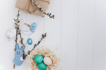 Easter concept. greeting card, eggs  and present on a white background
