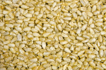 
Background of seeds, glued together with sweet glaze