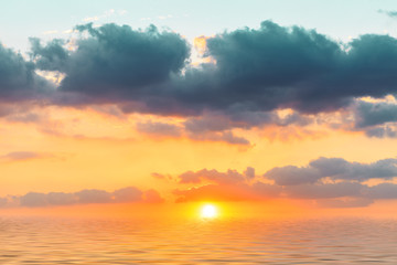 Sky and water reflection scene at dusk