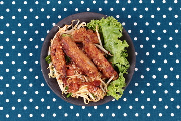 Fried steamed grated radish with shallot and bean sprouts.