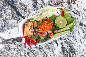 Sliced grilled beef salad , Laab Num Tok in Thai.