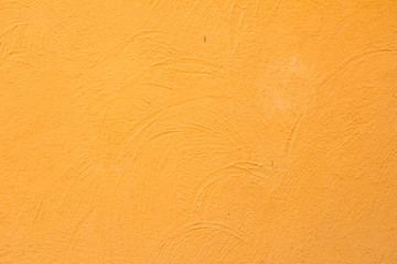 Orange color concrete wall background