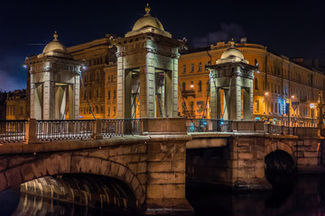 Stone bridge over the river. Bridge with columns. St. Petersburg. The bridge of Lomonosov.