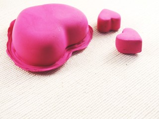 valentine love pink hearts close up top view with copy space