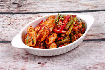Spicy fried cowpea and squid with roasted chile paste.