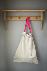 Cloth Drawstring Bag Hanging on Wall Rack